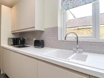 a kitchen with a sink and a window at 49 Waddington Road in Clitheroe