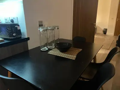 a black table with a bowl on top of it at Manhattan Apartment City Centre sleeps 4 in Liverpool