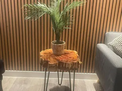 a potted plant on a table in a living room at Manhattan Apartment City Centre sleeps 4 in Liverpool