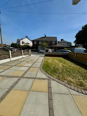 a sidewalk in a residential neighborhood with a fence at Stunning Open Plan 3 Bed House - Driveway & Garden in Litherland