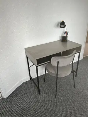 a desk with a chair and a lamp on it at Hamilton Hideaway between Lancaster & Morecambe in Bare