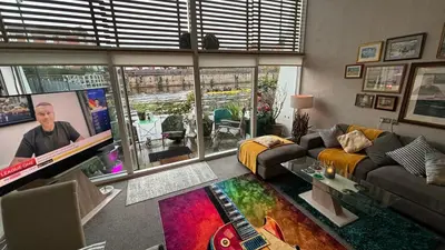 a living room with a flat screen tv at Float uniquely on Liverpool Waterfront on our high end 8 berth Houseboat in Liverpool