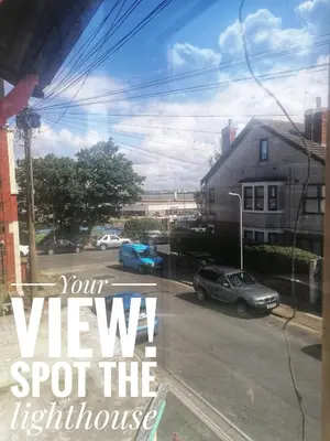 a view from a window with cars parked on a street at Aqua View, New Brighton Beach - 1 bedroom with BALCONY & VIEW in New Brighton