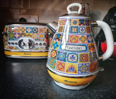 a multicolored coffee pot sitting on top of a counter at Aqua View, New Brighton Beach - 1 bedroom with BALCONY & VIEW in New Brighton