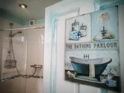 a bathroom with a sink and a bathtub on the wall at Aqua View, New Brighton Beach - 1 bedroom with BALCONY & VIEW in New Brighton