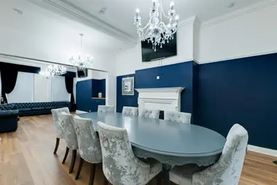 a dining room with a table and chairs at 9 Rodney Townhouse in Liverpool