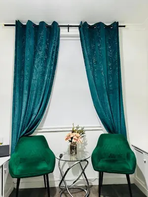 two green chairs and a glass table in front of a window at ENTIRE LUXURY HOUSE near CITY CENTRE - FREE PARKING in Liverpool