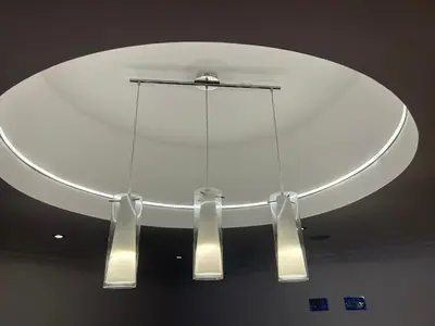 a round ceiling with three lights hanging from it at Entire Seaside Home 6 Private Bedrooms Sleeps 10 in Wallasey