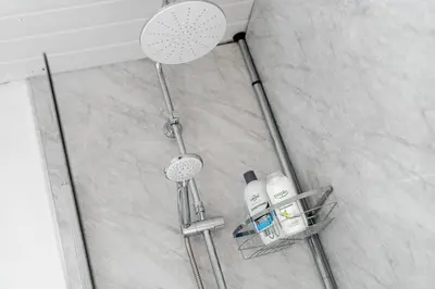 a shower in a bathroom with a shower at The Old Bike Cabin Flat 1 in Heapey