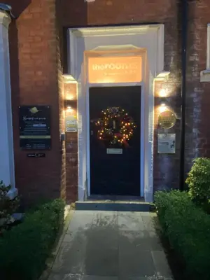a front door of a house with a wreath on it at The Rooms Lytham in Lytham St Annes
