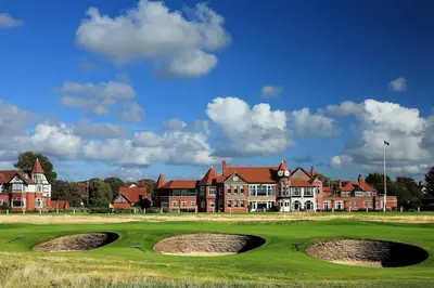 a view of a golf course with a building at Seaside Apartment in Moreton