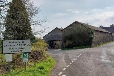 a street sign on the side of a road at 2 Bed Cottage in Peaceful South Lakes Village in Cark