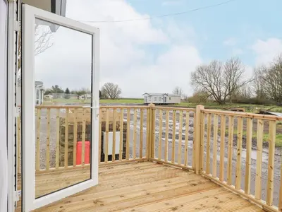 a view from a deck with a sliding glass door at Giorgio in Preston