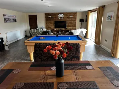 a living room with a pool table in it at Luxury Country Lodge in Bretherton - Sleeps 4 in Bretherton