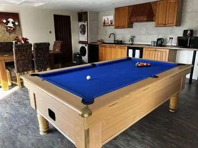 a pool table in the middle of a kitchen at Luxury Country Lodge in Bretherton - Sleeps 4 in Bretherton