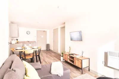 a living room with a couch and a table at Fabulous 1 Bed Apartment in Liverpool Centre in Liverpool