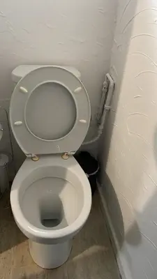 a bathroom with a white toilet in a room at Great House 5 Min walk 2 Beach best locations in Blackpool in Blackpool