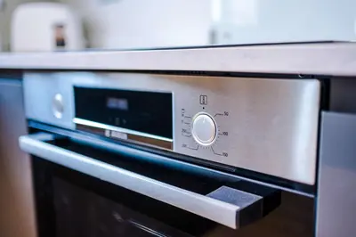 a close up of a microwave oven in a kitchen at Elysée Suites - Chic 1 Bed Flat in Southport in Southport