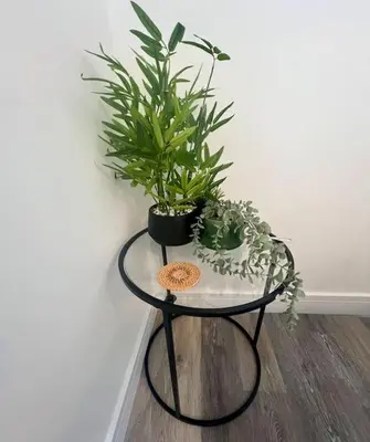 a table with potted plants on it next to a wall at 2 Bed Preston City Centre Flat - Sleeps 4 with parking in Preston