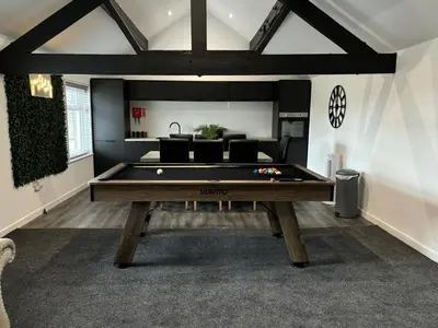 a living room with a pool table in it at Apartment Twenty4 Blackpool in Blackpool