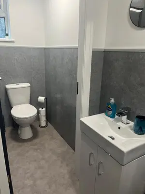 a bathroom with a white toilet and a sink at Apartment Twenty4 Blackpool in Blackpool