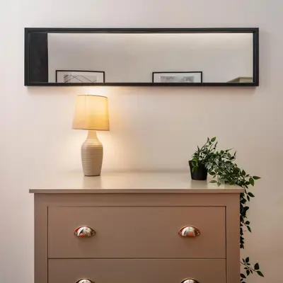 a dresser with a lamp and a mirror on the wall at Lombana Apt 4 - City Centre - Parking in Liverpool