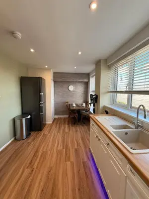 a kitchen with a sink and a counter top at The Beachcomber - seafront, free parking, free wifi in Cleveleys