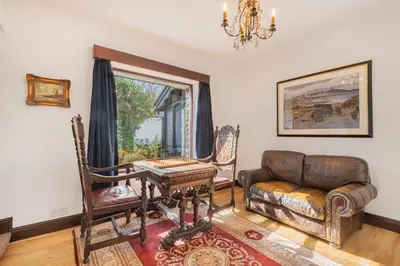 a living room with a couch and a chair at Bayview House Silverdale in Silverdale