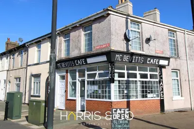 a building on the corner of a street at Light House View in Fleetwood