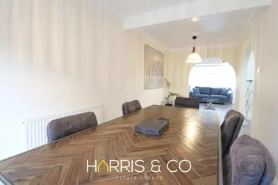 a dining room with a table and chairs at Poolfoot Villas in Thornton