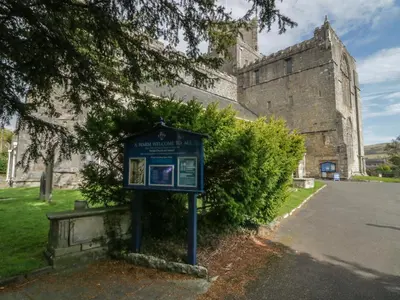 a blue sign in front of a building at Edgemere Retreat in Grange Over Sands