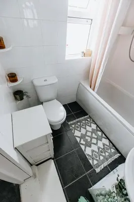 a white bathroom with a toilet and a sink at SUN COTTAGE - Cosy Cottage in Ulverston with a log burner in Ulverston, Cumbria in Ulverston