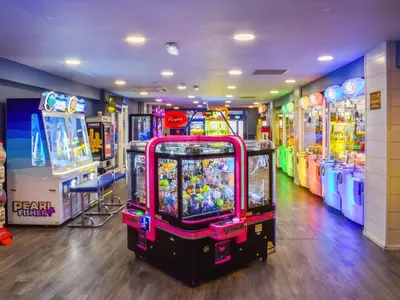 a arcade with many arcade games in a room at Marni's Seaview in Heysham