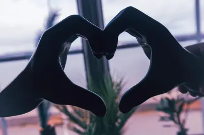 a pair of hands in the shape of the m at Kos apartment 5 in Liverpool