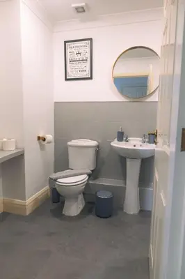 a bathroom with a toilet and a sink at Kos apartment 5 in Liverpool