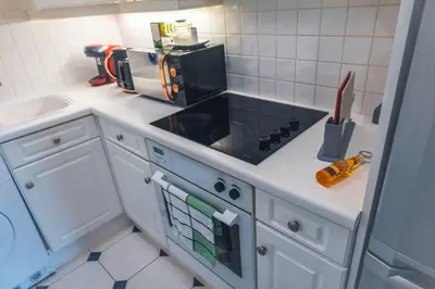 a kitchen with a counter top with a microwave at Kos apartment 5 in Liverpool
