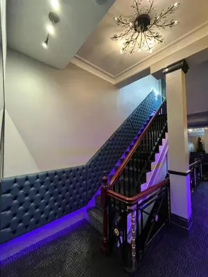 a set of stairs with purple lighting at 101 Bold Street Apartments in Liverpool