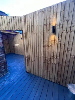a room with a wooden wall and a fence at 101 Bold Street Apartments in Liverpool