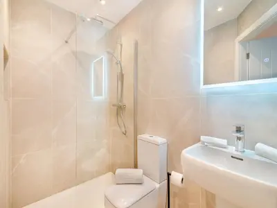 a bathroom with a toilet and a sink at Cherry Tree Cottage - Uk47756 in Mellor