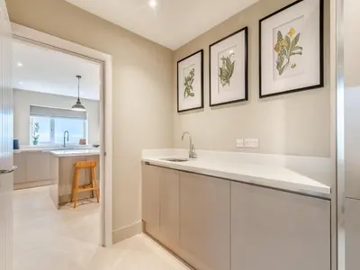 a kitchen with a sink and a counter top at Cherry Tree Cottage - Uk47756 in Mellor