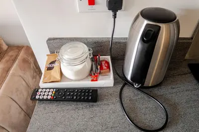 a coffeemaker sitting next to a coffee maker at 1-BD Apartment with Sofa Bed In The Heart of Liverpool in Liverpool