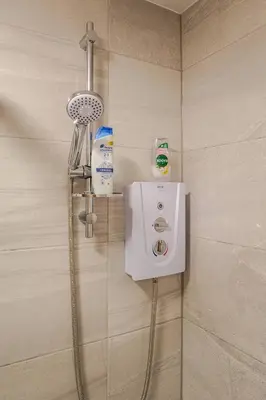 a shower in a bathroom with a shower at 1-BD Apartment with Sofa Bed In The Heart of Liverpool in Liverpool