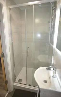 a bathroom with a shower and a sink at Walk to City Hotspots Liverpool 1BD Apartment in Liverpool