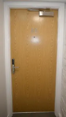 a wooden door with the letter b on it at Walk to City Hotspots Liverpool 1BD Apartment in Liverpool