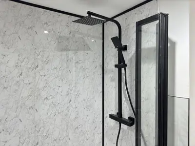 a shower with a glass door in a bathroom at Contractors and Groups with Parking in Liverpool