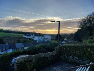 a street light in a small town with houses at Sunny Bank, Cark-in-Cartmel in Cark
