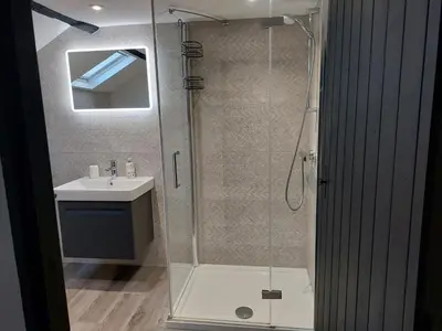 a bathroom with a shower and a sink at Sunny Bank, Cark-in-Cartmel in Cark