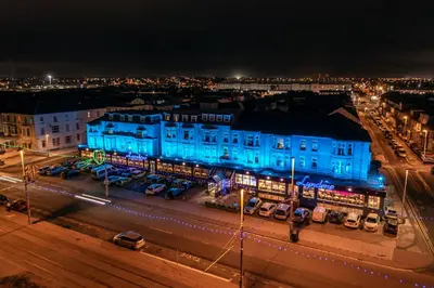 a city at night with blue lights at Lyndene Hotel in Blackpool
