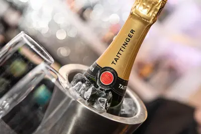 a champagne bottle sitting in a metal bucket at Lyndene Hotel in Blackpool