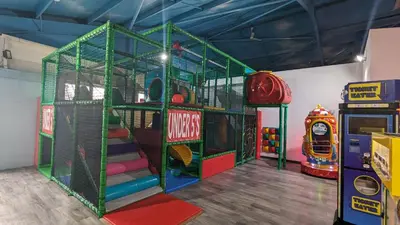 a play room with a play structure with stairs at Jenny and Jamie's holiday home on the edge in Morecambe